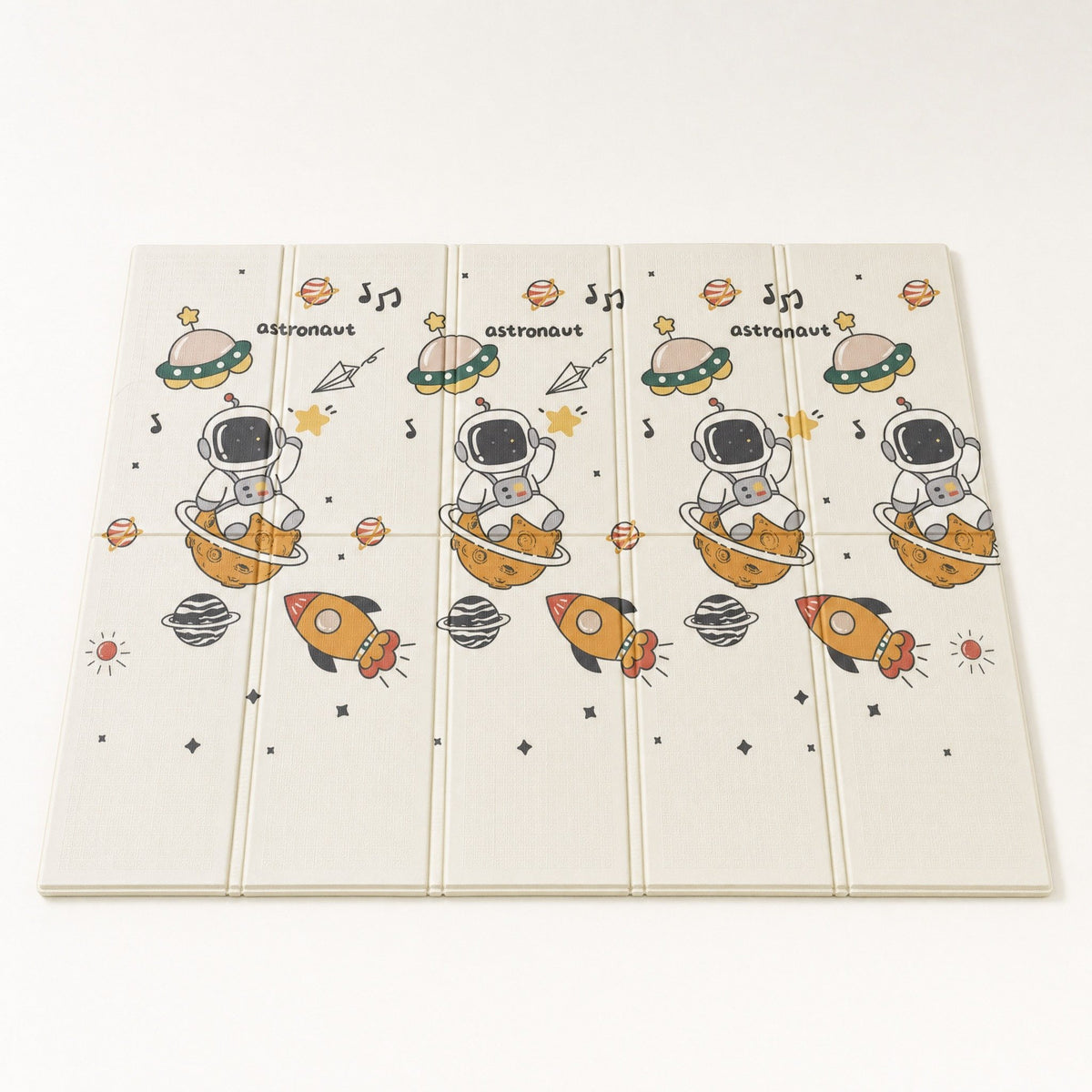 Tapis de jeu bébé pliable et réversible astronaute et planètes, vu en entier sur fond clair