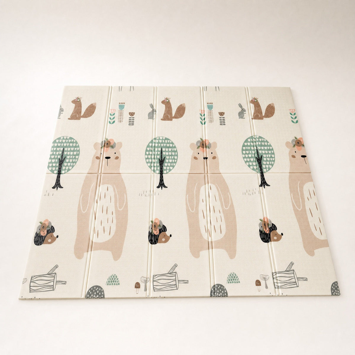 Tapis d'éveil bébé pliable et réversible forêt et lion, vu en entier sur fond clair
